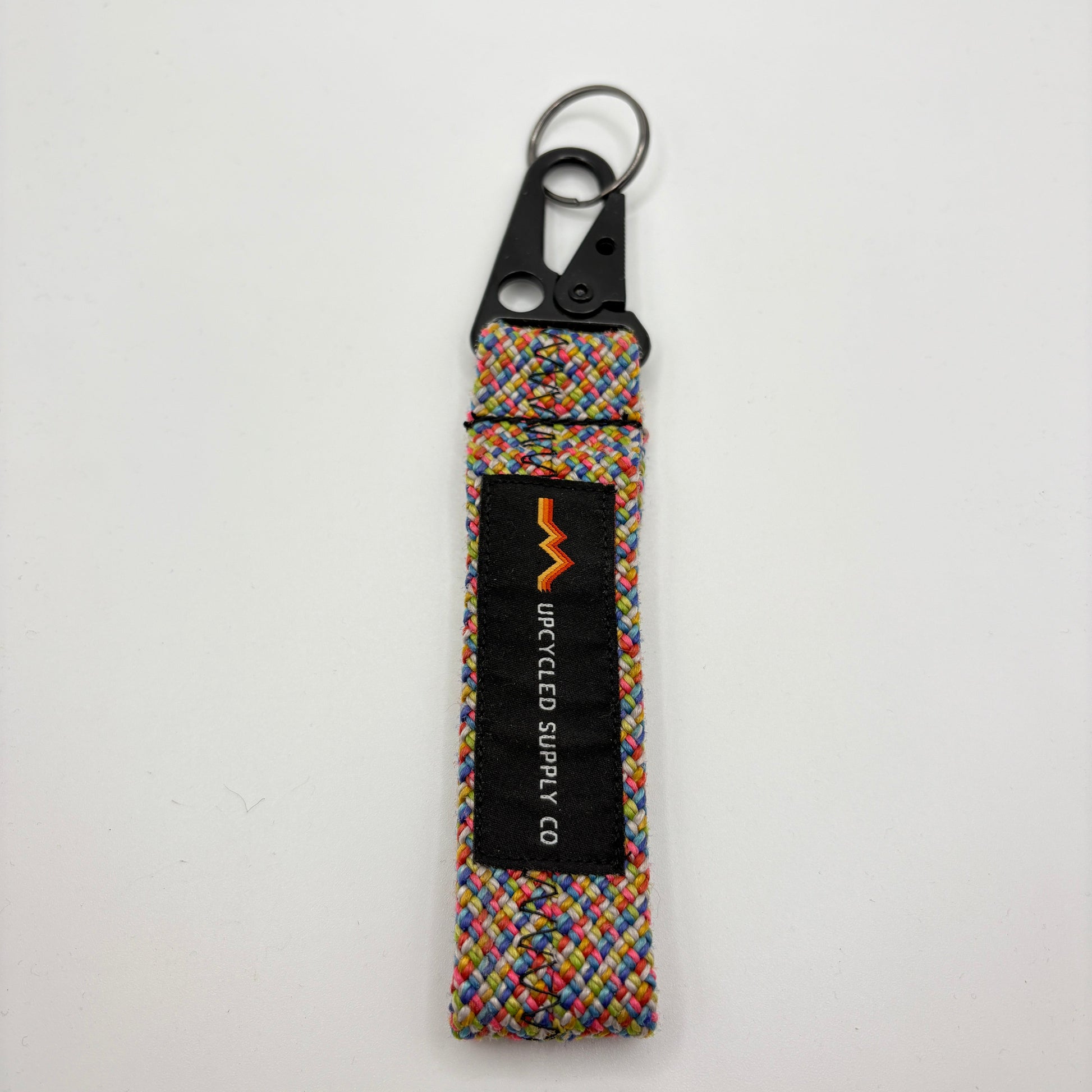 Colorful keychain with a brand logo on a white background