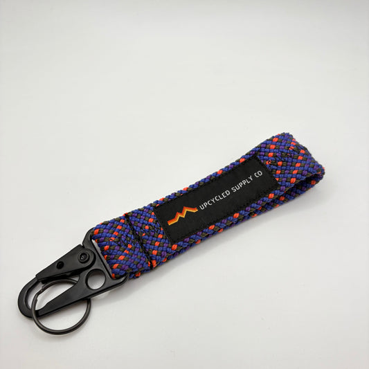 Keychain with blue and orange pattern on a white background