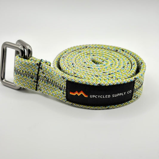 belt with a brand label on a light gray background