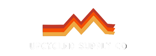Logo of Upcycled Supply Co with colorful zigzag design on a black background