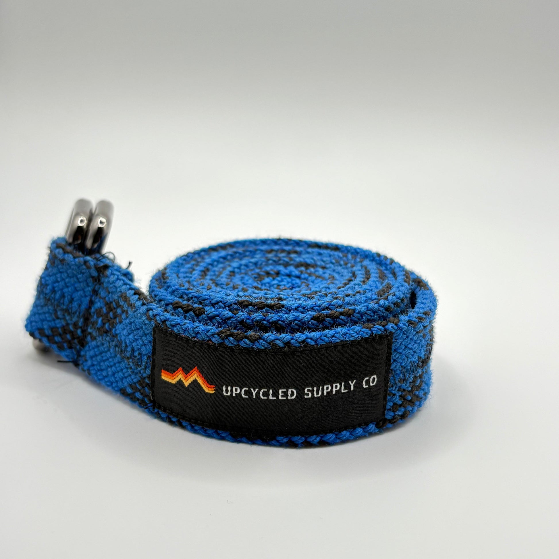 Blue strap with a brand label on a white background